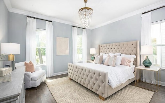 774 Clay Field Trl, Summerville, SC 29485 - bedroom with a chandelier, ornamental molding, baseboards, and wood finished floors