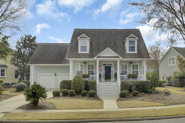 new england style home with ceiling fan, driveway, a porch, and a garage