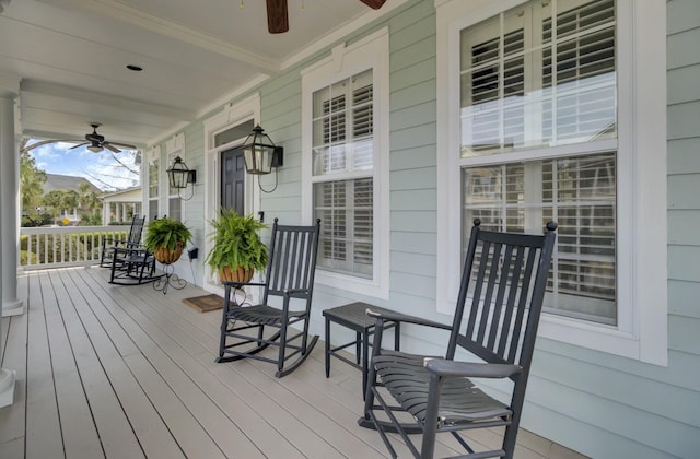 deck featuring a porch and a ceiling fan