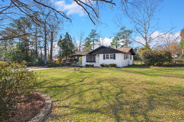 exterior space with a front yard