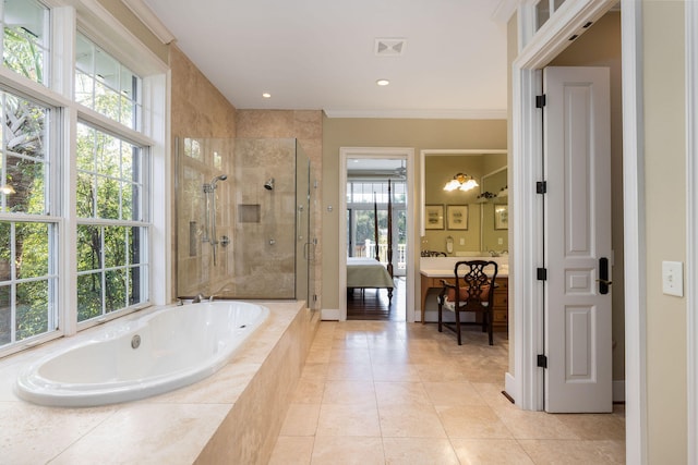 bathroom featuring ornamental molding, independent shower and bath, and tile patterned floors