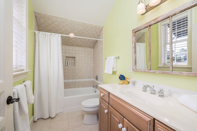 full bathroom with vanity, toilet, tile patterned floors, and shower / tub combo with curtain