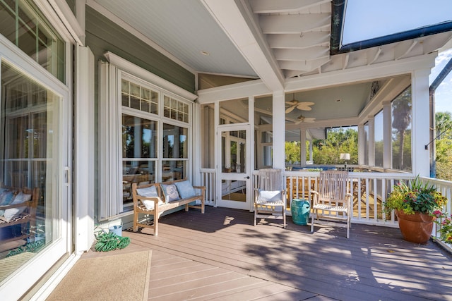 wooden deck with ceiling fan