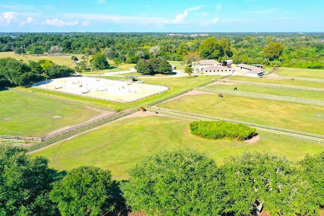 birds eye view of property with a rural view