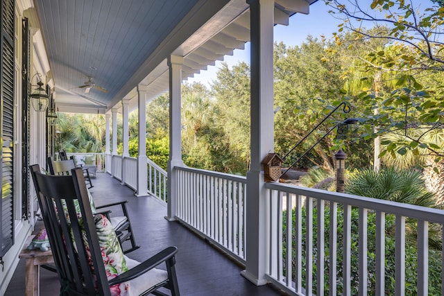 wooden terrace with a porch