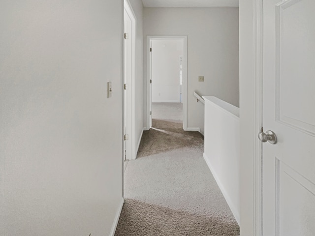 corridor with carpet floors