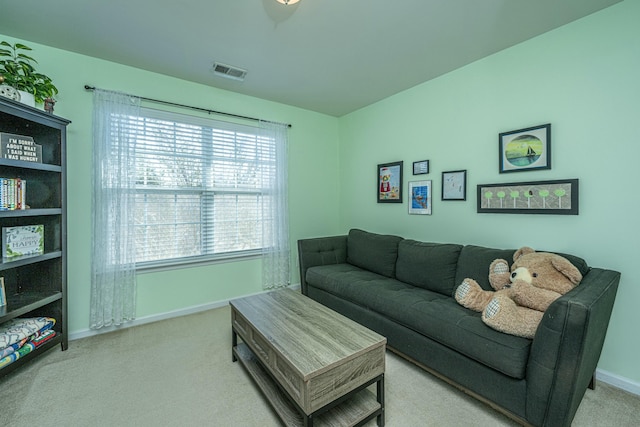 living room with light colored carpet