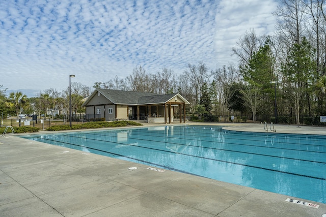 view of swimming pool featuring a patio area