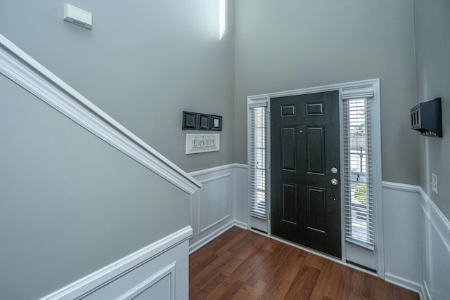 entryway with dark wood-type flooring