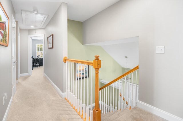 1813 Parkland Preserve Ln, Charleston, SC 29412 - corridor featuring attic access, an upstairs landing, carpet, and baseboards