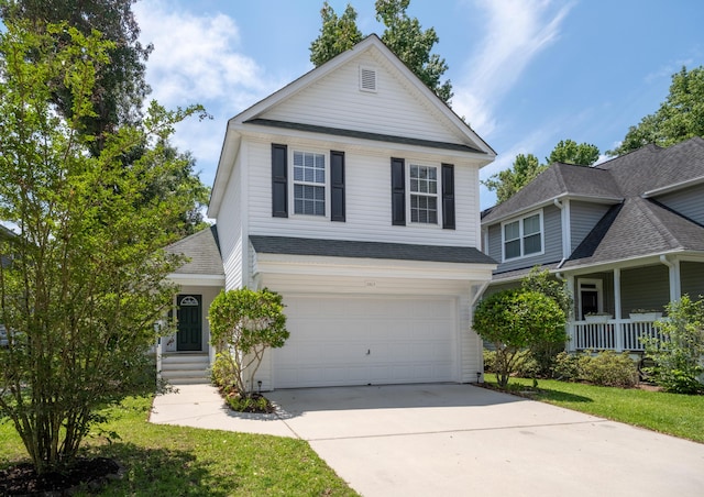 1813 Parkland Preserve Ln, Charleston, SC 29412 - traditional-style house with concrete driveway, a garage, roof with shingles, and covered porch