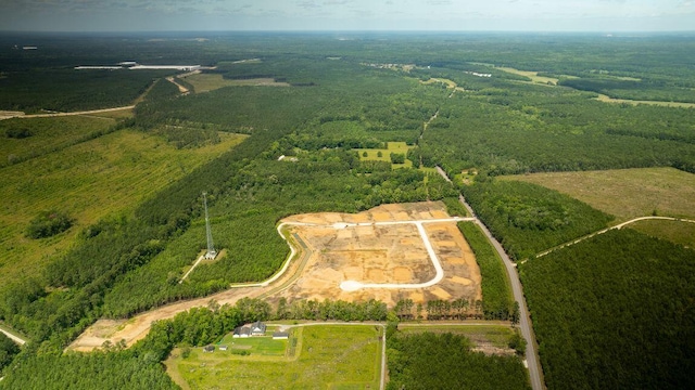 birds eye view of property with a rural view