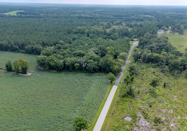 bird's eye view featuring a forest view