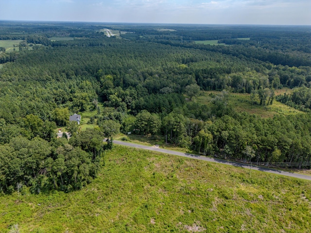 aerial view featuring a forest view