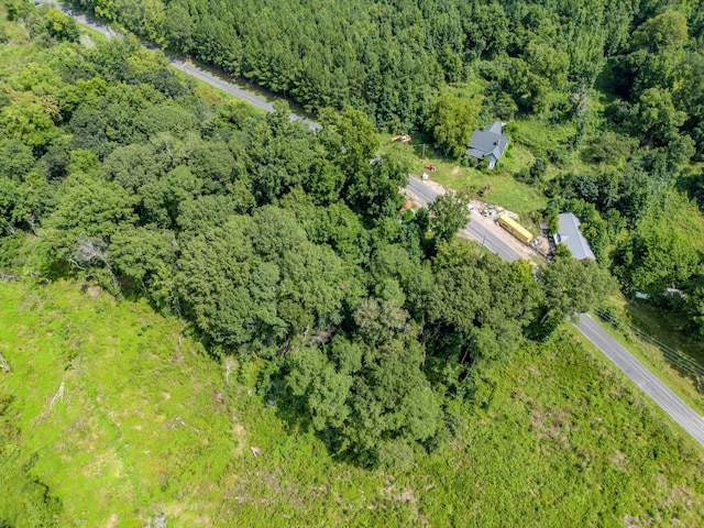 aerial view featuring a forest view