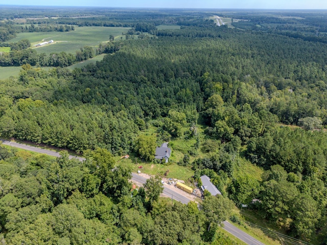 aerial view featuring a view of trees