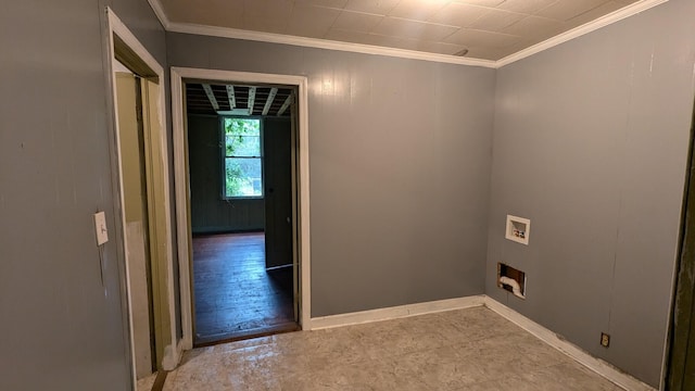 laundry room with washer hookup, laundry area, crown molding, and baseboards