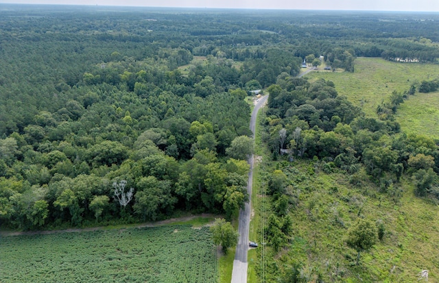 aerial view featuring a forest view