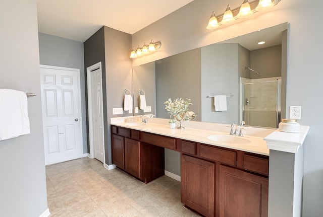 115 Hyrne Dr, Goose Creek, SC 29445 - full bathroom featuring a shower stall, double vanity, tile patterned flooring, and baseboards