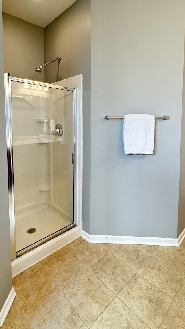 115 Hyrne Dr, Goose Creek, SC 29445 - bathroom with a stall shower, baseboards, and tile patterned flooring
