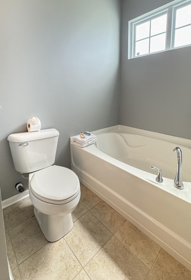 115 Hyrne Dr, Goose Creek, SC 29445 - full bathroom with toilet, a bath, tile patterned floors, and baseboards