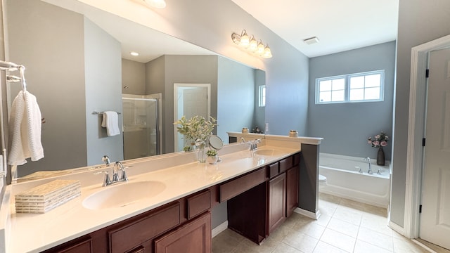 115 Hyrne Dr, Goose Creek, SC 29445 - bathroom with a shower stall, a bath, double vanity, and tile patterned flooring