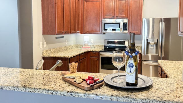 115 Hyrne Dr, Goose Creek, SC 29445 - kitchen featuring appliances with stainless steel finishes and light stone countertops