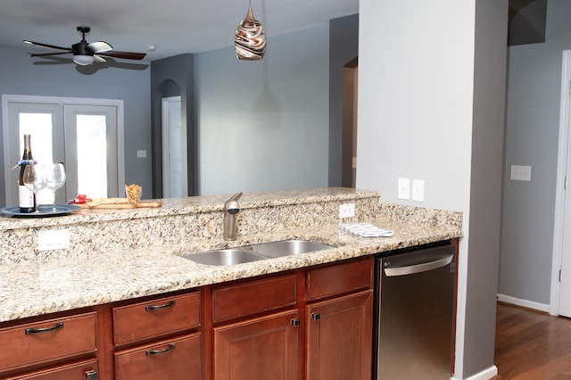 115 Hyrne Dr, Goose Creek, SC 29445 - kitchen featuring stainless steel dishwasher, a sink, dark wood-type flooring, ceiling fan, and light stone countertops