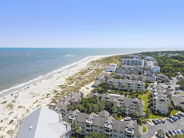 drone / aerial view with a water view and a view of the beach