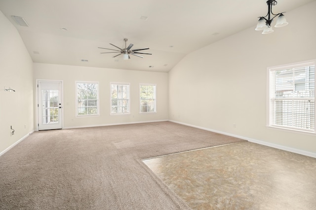 unfurnished living room with lofted ceiling, light carpet, visible vents, a ceiling fan, and baseboards