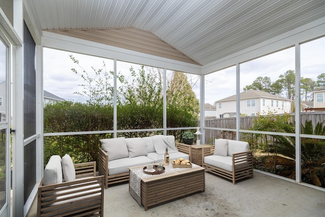 sunroom / solarium with lofted ceiling