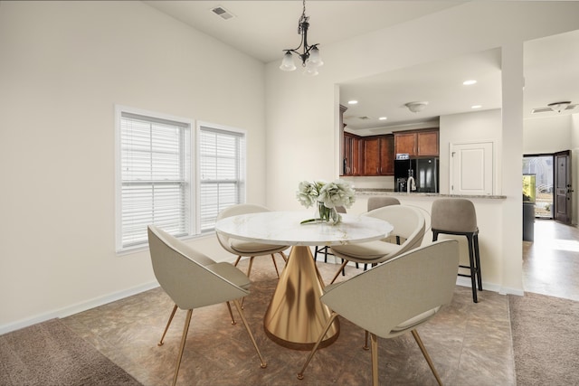 dining space with recessed lighting, visible vents, and baseboards