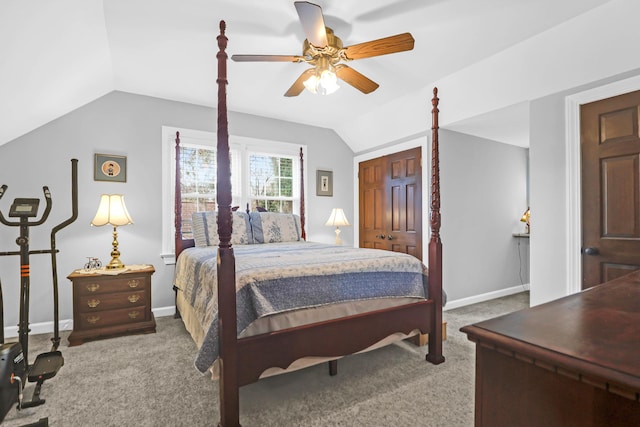 carpeted bedroom featuring ceiling fan, a closet, and lofted ceiling