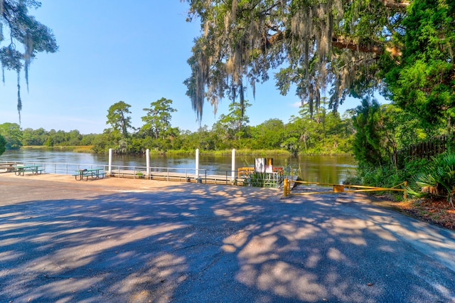 exterior space with a water view