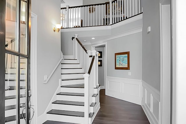 stairway featuring hardwood / wood-style floors