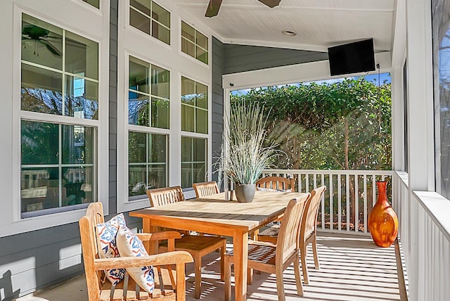 sunroom / solarium with ceiling fan