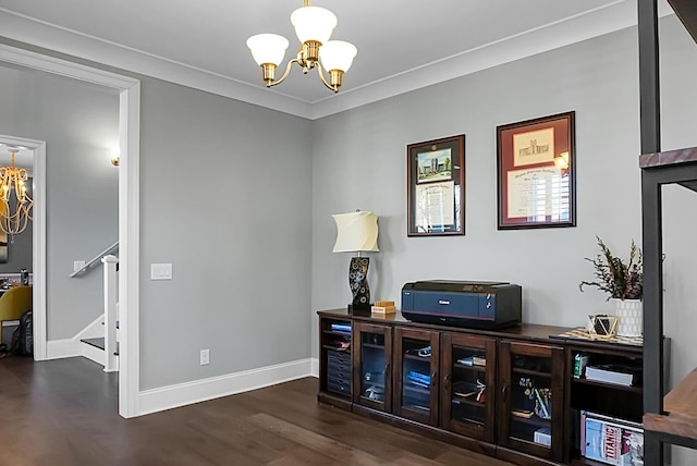 office area featuring a chandelier, dark hardwood / wood-style floors, and ornamental molding