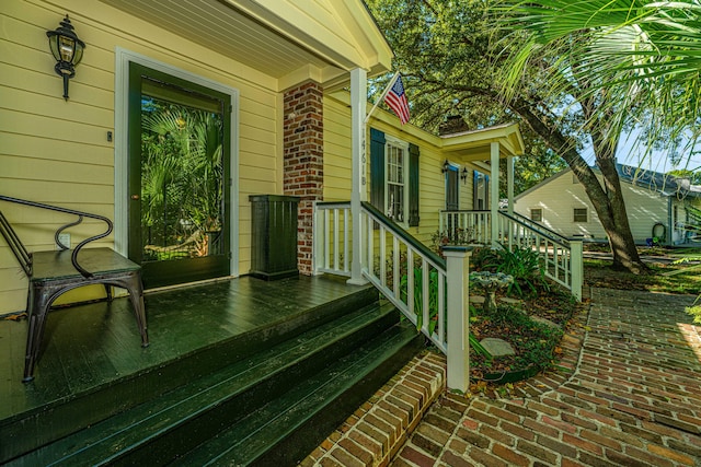 wooden terrace featuring a porch