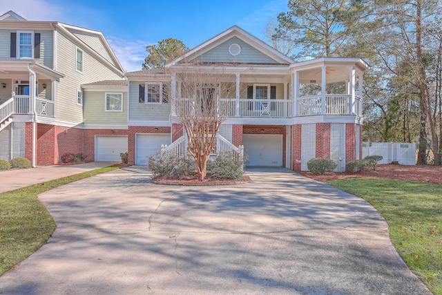 view of front of property with a garage and covered porch