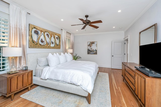 bedroom with light wood-style flooring, ornamental molding, recessed lighting, baseboards, and ceiling fan