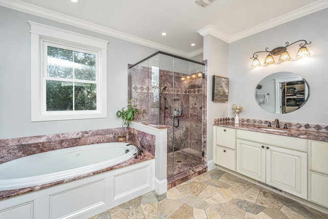 full bathroom with visible vents, a garden tub, a stall shower, ornamental molding, and vanity