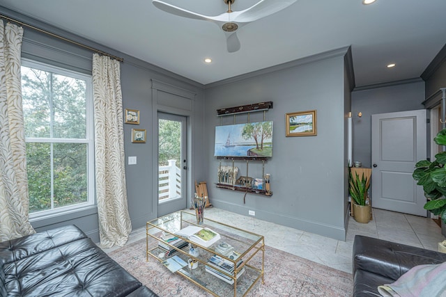 living area with a wealth of natural light, baseboards, recessed lighting, and crown molding