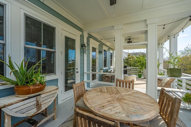 exterior space with ceiling fan