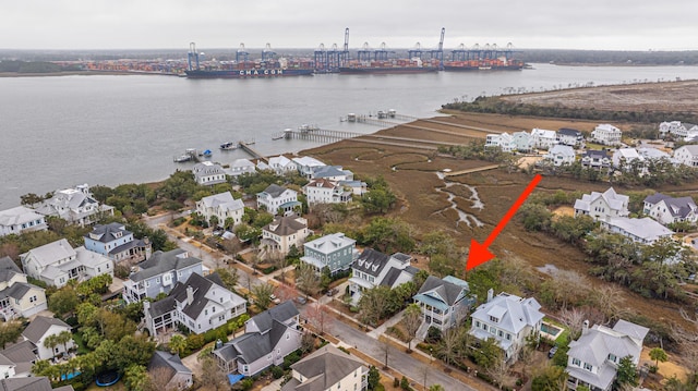 aerial view featuring a water view and a residential view