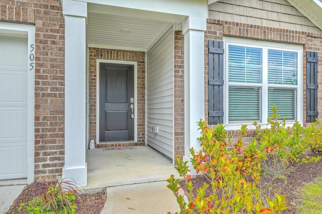 505 Shady Maple St, Moncks Corner, SC 29461 - view of exterior entry with brick siding and covered porch