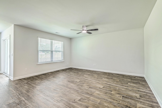 505 Shady Maple St, Moncks Corner, SC 29461 - spare room featuring wood finished floors, a ceiling fan, and baseboards