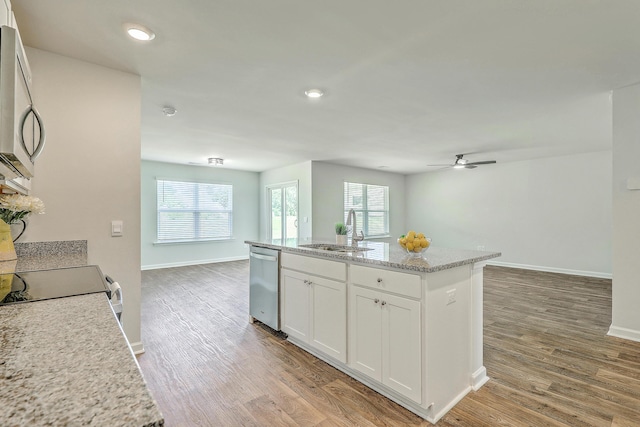 505 Shady Maple St, Moncks Corner, SC 29461 - kitchen featuring stainless steel appliances, a sink, light wood-style flooring, an island with sink, and open floor plan