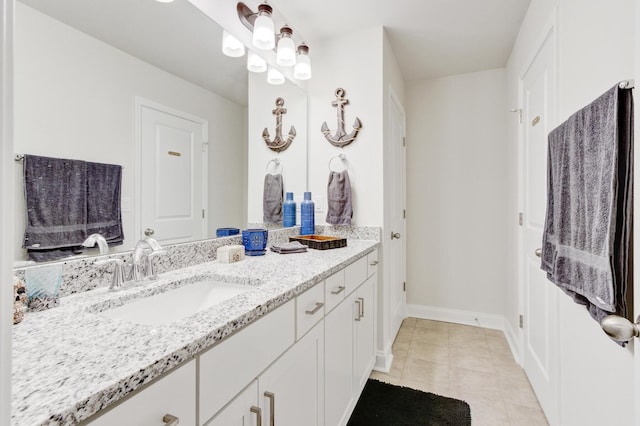 bathroom featuring vanity and tile patterned flooring