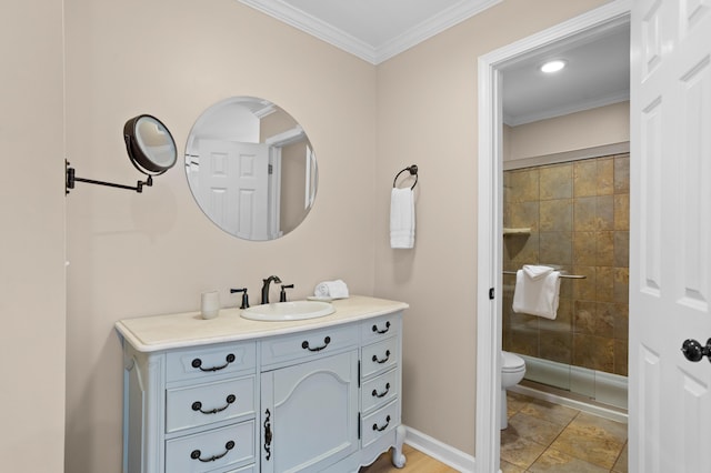 full bathroom with crown molding, baseboards, toilet, a tile shower, and vanity