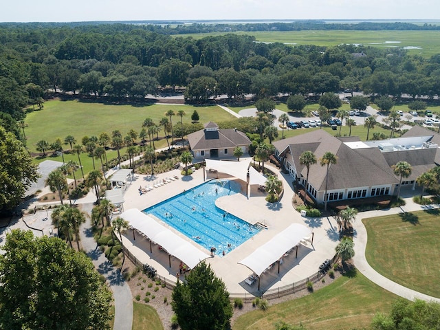 bird's eye view featuring a wooded view